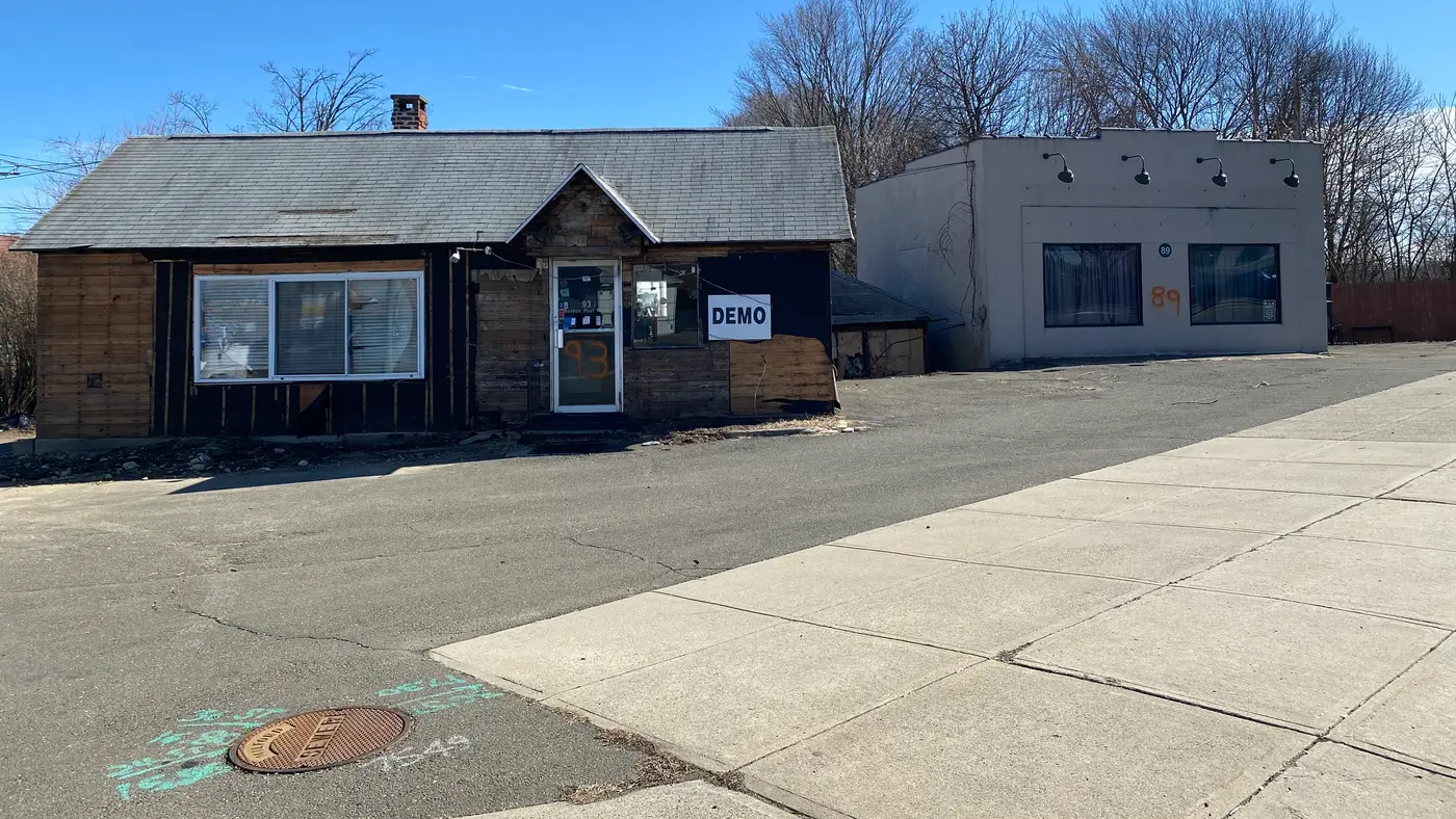 Derelict building marked for demolition at the Post Road project in Milford, CT